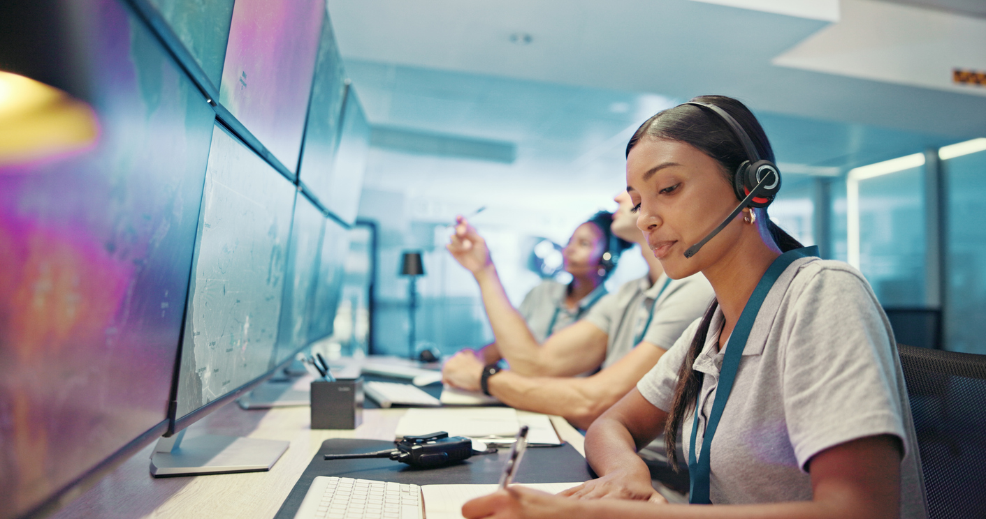 Computer, emergency service and woman with headset for security, dispatcher and operator. Telecommunication, surveillance office and first responder with monitor for incident report, contact and help